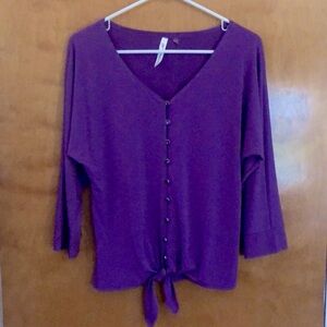 Women’s medium blouse. Purple with buttons and tie at waist.